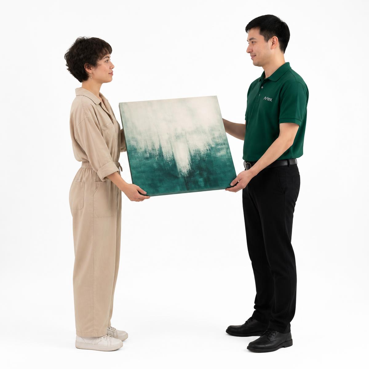 An artist handing a finished painting to a TheMeral representative in an emerald green uniform